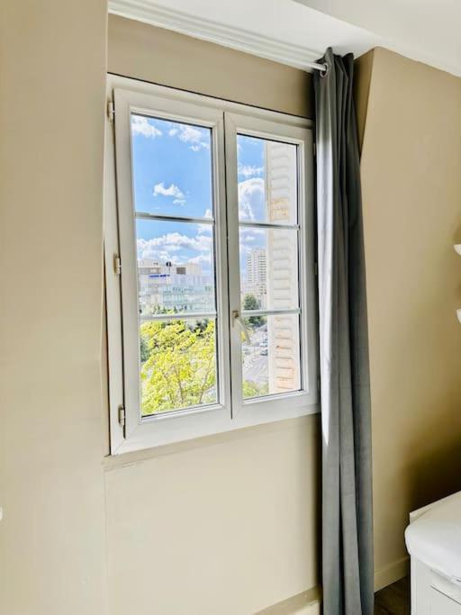 Appartement Vue Tour Eiffel Ligne 14 A Cote De Paris Gentilly Kültér fotó